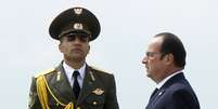 L&iacute;deres mundiais, como o presidente da R&uacute;ssia, Vladimir Putin, e o da Fran&ccedil;a, Fran&ccedil;ois Hollande, participam da cerim&ocirc;nia que lembra o centen&aacute;rio do genoc&iacute;dio arm&ecirc;nio nesta sexta-feira  Foto: David Mdzinarishvili / Reuters