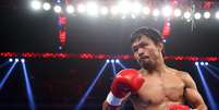 Manny Pacquiao fugiu de casa aos 12 anos e passou a vender doces na rua para sobreviver  Foto: Chris Hyde / Getty Images 