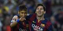 Messi fez o primeiro em um pênalti de cavadinha  Foto: Lluis Gene / AFP