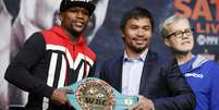 Mayweather e Pacquiao se enfrentam no sábado  Foto: John Locher / AP