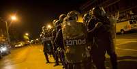 Policiais na Avenida Pensilvânia, em Baltimore, durante protesto  Foto: Eric Thayer / Reuters