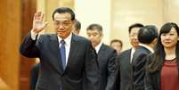 Primeiro-ministro chinês, Li Keqiang, durante encontro em Pequim, em 14 de abril   Foto: Shigeru Nagahara/Kyodo News / Reuters