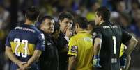 Boca Juniors acabou excluído da Libertadores após ataque de sua torcida a jogadores do River Plate  Foto: Victor R. Caivano / AP