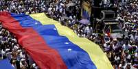 Venezuelanos realizam protesto neste sábado  Foto: AFP
