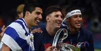 Ataque formado por Messi, Suárez e Neymar foi responsável por 122 gols na temporada  Foto: Patrik Stollarz / AFP