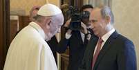 Papa e Putin expressaram a necessidade de criar no Oriente Médio "as condições necessárias para a vida de todos os componentes da sociedade, incluindo as minorias religiosas, em particular cristãs"  Foto: Alexei Nikolsky / Reuters