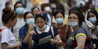 Turistas usam máscaras para prevenir contrair a Mers no centro de Seul, na Coreia do Sul. 12/06/2015  Foto: Kim Hong-Ji / Reuters