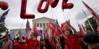 A Suprema Corte dos Estados Unidos legalizou nesta sexta-feira o casamento homossexual em todos os estados do país  Foto: Jacquelyn Martin / AP