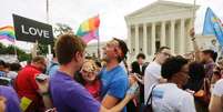 Apoiadores do movimento dos direitos dos gays comemoram decisão da Suprema Corte, em Washington, nos Estados Unidos, nesta sexta-feira. 26/06/2015  Foto: Jim Bourg / Reuters