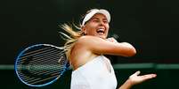 Sharapova passou com facilidade por holandesa  Foto: Julian Finney / Getty Images