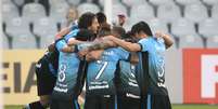 Grêmio comemora a vitória fácil na Vila Belmiro  Foto: Guilherme Dionizio / Gazeta Press