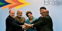Os l&iacute;deres dos Brics (da esq): Vladimir Putin (R&uacute;ssia), Narendra Modi (&Iacute;ndia), Dilma Rousseff, Xi Jinping (China) e Jacob Zuma (&Aacute;frica do Sul)  Foto: Getty Images