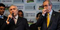 Ao lado de Cunha, Temer diz que PMDB quer ser cabeça de chapa nas eleições presidenciais de 2018  Foto: Antônio Cruz / Agência Brasil