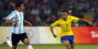 Rafinha defendeu o Brasil na Olimpíada de 2008, que não conta como competição de seleções principais para a Fifa  Foto: Shaun Botterill / Getty Images 