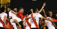 River Plate está garantido no Mundial de Clubes da Fifa, em dezembro, e na Recopa Sul-Americana em 2016  Foto: Andres Cristaldo / EFE