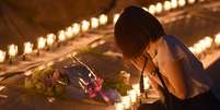 Os participantes acenderam 520 velas na hora exata do acidente e farão um minuto de silêncio.  Foto: Getty Images