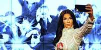 Para muitos, Kim Kardashian pode ser vista como un produto artificial, como a boneca do Museu de Madame Tussauds. Para os 43,3 milhões de seguidores no Instagram ela é um ícone  Foto: Getty Images