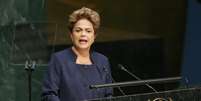  “O Brasil é um dos poucos países em desenvolvimento a assumir uma meta absoluta de redução de emissões. Temos uma das maiores populações e PIB [Produto Interno Bruto] do mundo e nossas metas são tão ou mais ambiciosas que aquelas dos países desenvolvidos”, discursou Dilma  Foto: EFE