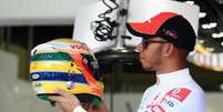 Britânico já correu com um capacete alusivo ao de Senna e sempre afirmou que piloto brasileiro é seu grande ídolo  Foto: Getty Images