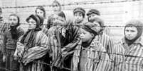 Crianças sobreviventes em Auschwitz - foto tirada de imagens gravadas pelas forças soviéticas  Foto: United States Holocaust Memorial Museum / BBCBrasil.com