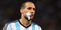 Zabaleta sofreu lesão no joelho enquanto defendia o City no Campeonato Inglês  Foto: Matthias Hangst / Getty Images