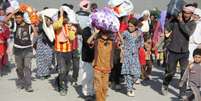 A fuga de Yazidis de Sinjar, em foto de arquivo, após ataques do Estado Islâmico  Foto: Divulgação/BBC Brasil / BBC News Brasil