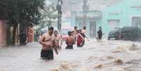 Alagamento na avenida Água Fria, zona norte de São Paulo (SP), na tarde desta sexta-feira (25).  Foto: Willians Queiroz/Futura Press