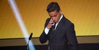Wendell Lira se emociona ao receber o Prêmio Puskas  Foto: Philipp Schmidli / Getty Images