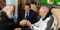 O patriarca ortodoxo russo Kirill com o l&iacute;der cubano Fidel Castro  Foto: EFE