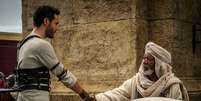 Jack Huston interpreta Ben-Hur e Morgan Freeman é Ilderim  Foto: Divulgação / Guia da Semana