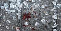 Rastro de sangue no chão após ataques em Bruxelas  Foto: Getty Images 