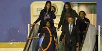 Presidente Barack Obama chega com sua família à Argentina  Foto: EFE