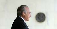 Sem discursar em jantar, Temer pediu que parlamentares trabalhem duro para garantir que o Senado aprove o afastamento de Dilma  Foto: Agência Brasil/Marcelo Camargo / O Financista