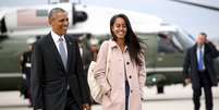 Malia Obama com o pai  Foto: Reuters
