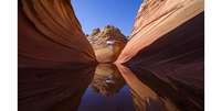 Uma longa viagem de carro e uma longa caminhada valeram a pena para Kenji Yamamura, que registrou essa imagem de formações rochosas em Utah, nos EUA.  Foto: BBC Brasil