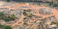 O rompimento da barragem do Fundão em Mariana deixou 19 pessoas mortas, causou destruição da vegetação nativa e poluiu a bacia do Rio Doce  Foto: Fred Loureiro/ Secom ES / Agência Brasil