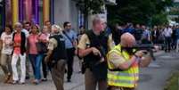 Policiais foram mobilizados em grande número para buscar autores de ataque  Foto: Getty Images / BBC News Brasil