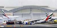 Avião pegou fogo após chegada ao aeroporto de Dubai  Foto: EFE