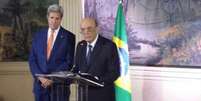 O secretário de Estado norte-americano, John Kerry, e o ministro das Relações Exteriores, José Serra, em pronunciamento após encontro   Foto: Agência Brasil