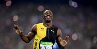 O corredor jamaicano Usain Bolt venceu pela terceira vez seguida a prova ol&iacute;mpica dos 100m rasos   Foto: Getty Images