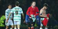 Joseph Edwards e Wayne Rooney  Foto:  Michael Steele / Getty Images