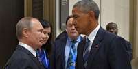 Vladímir Putin e Barack Obama conversam durante reunião do G20 na China  Foto: EFE