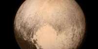 Plut&atilde;o foi descoberto em 1930, mas perdeu o status de planeta em 2006  Foto: NASA / BBC News Brasil