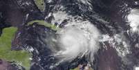 Imagem de satélite mostra a passagem do furacão Matthew pelo Caribe  Foto: EFE