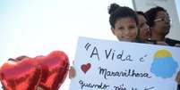 Crianças que sofrem de doenças raras foram ao ato em frente ao Museu do Amanhã  Foto: Agência Brasil