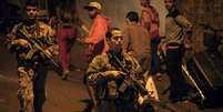 Com 38 unidades em diferentes favelas da cidade, o programa de UPPs tem mais de 9 mil policiais e enfrenta dificuldades   Foto: Getty Images