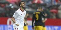 O defensor argentino Nico Pereja, do Sevilla, celebra a vitória sobre o Atlético de Madrid  Foto: EFE