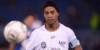 O irmão e agente de Ronaldinho Gaúcho, Assis, disse que pode conversar com a Chape pelo acordo  Foto: AFP / LANCE!