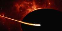Desenho representa uma estrela parecida com o Sol sendo despedaçada por um buraco negro  Foto: NASA