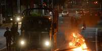 Clima de tensão durante protesto de moradores em frente ao Comando Geral da Polícia Militar do Espírito Santo em Maruípe (/Agência Brasil)  Foto: Agência Brasil